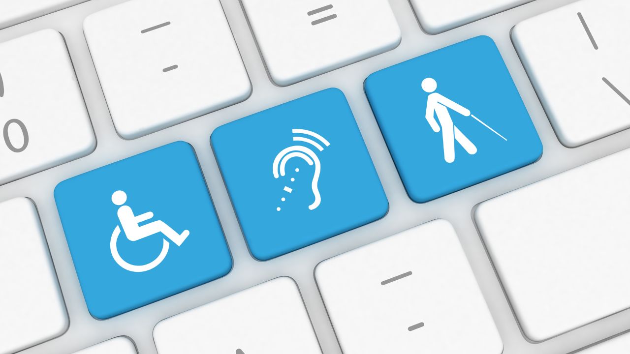 A diverse group of people with various disabilities using assistive technologies to navigate a website.