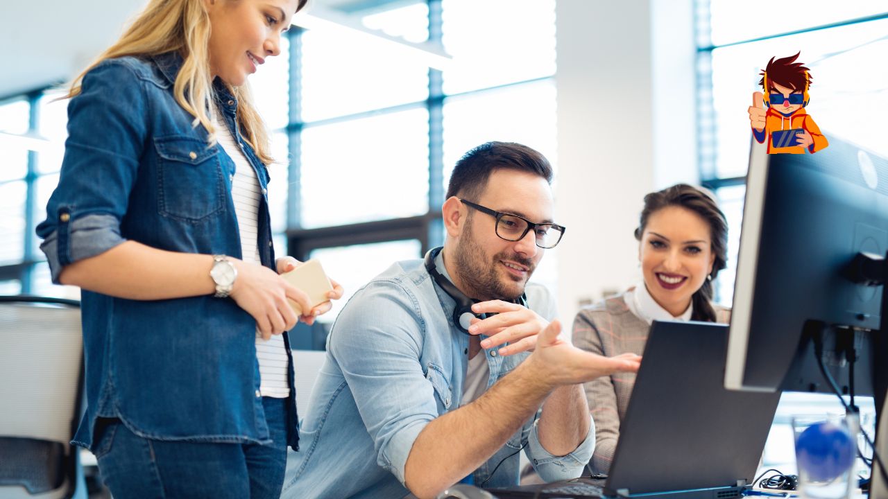 The Pros and Cons of In-House Marketing vs. Outsourcing Group of three young professionals collaborating in front of a computer in a modern office.
